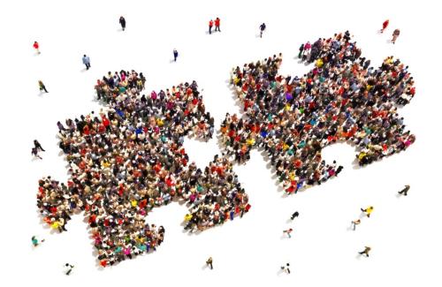 icon of people in a puzzle shape representing collaboration